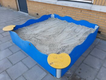Zandbak met afdekgaas
