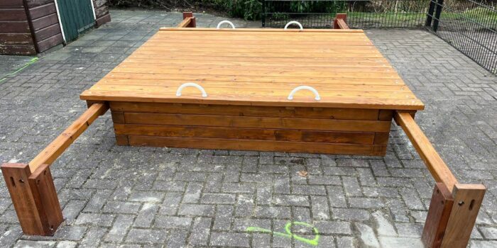 Zandbak met schuifdeksel